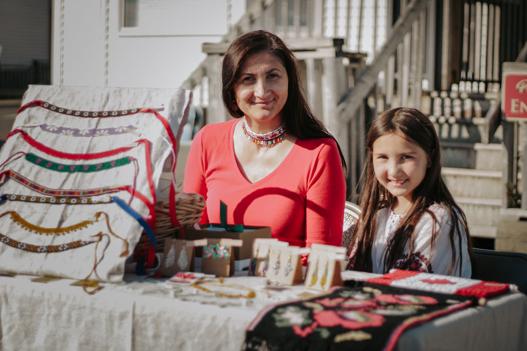 Family sitting at event table